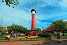 Wangerooge: Der alte Leuchtturm, der unter Denkmalschutz steht, dient heute als Heimatmuseum und als Aussichtsplattform.